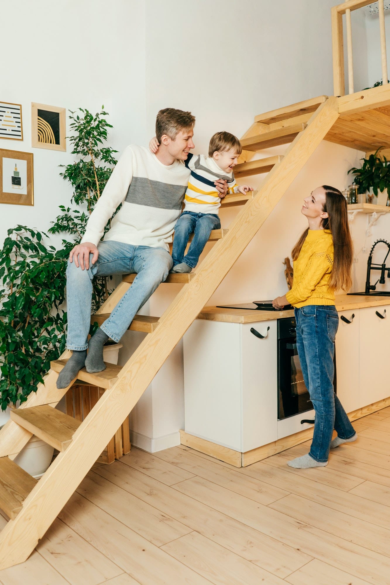Happy family in house, yellow gray colors.